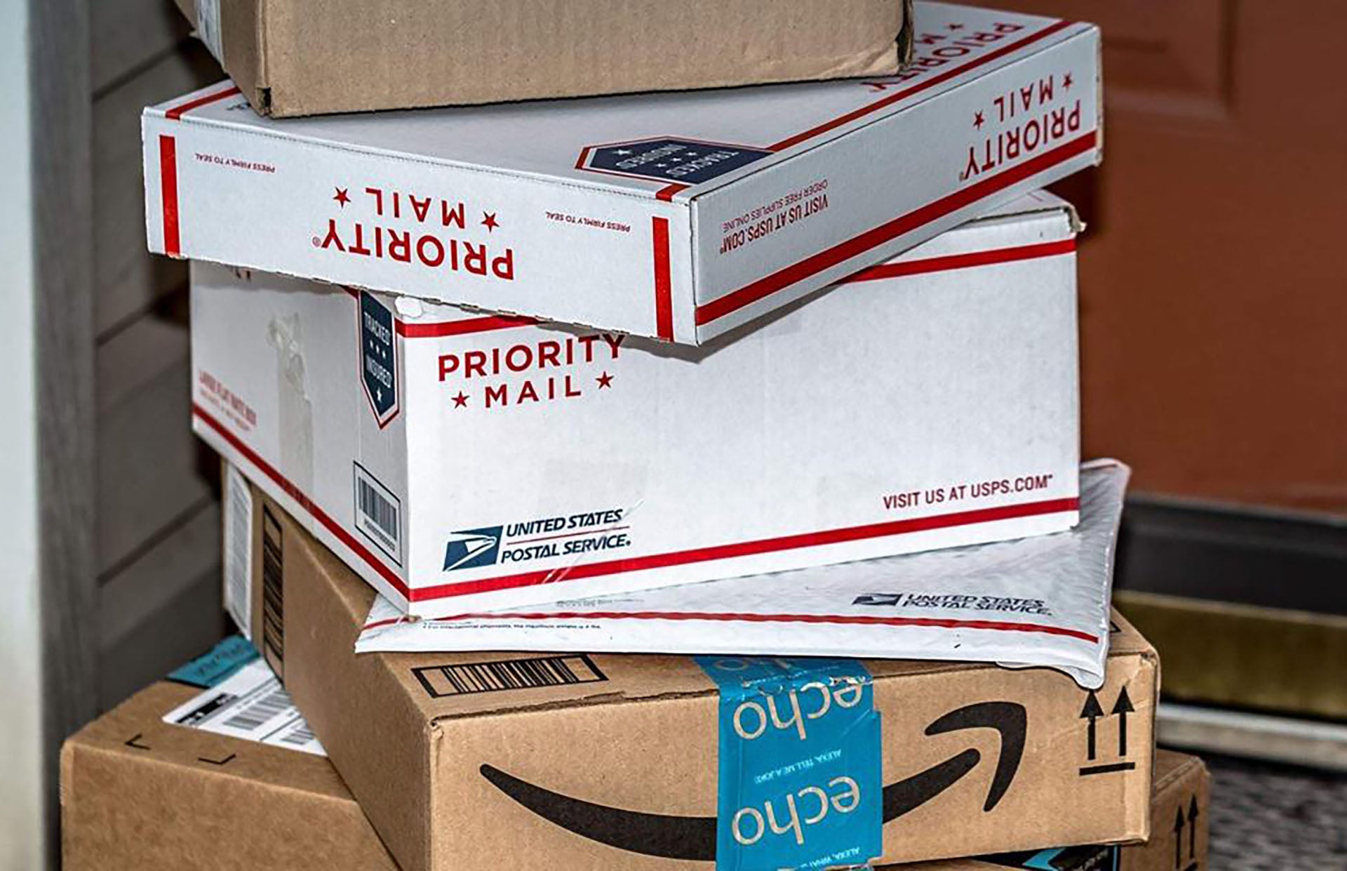 stack of amazon packages