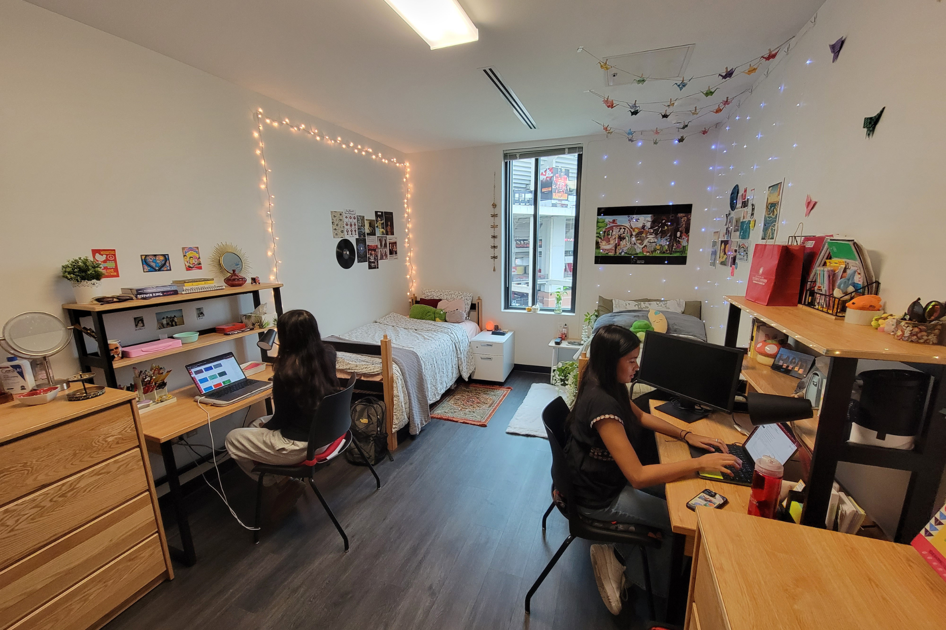 students working at their desks in residence hall room
