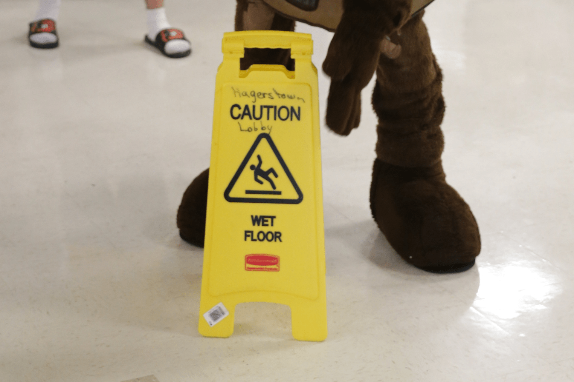 yellow caution wet floor sign