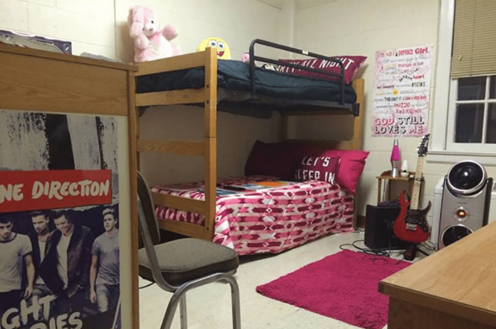 double room with beds arranged as bunk beds facing same direction 