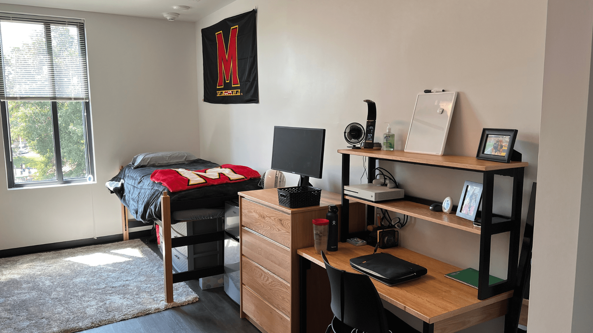 residence hall room decorated with Maryland gear