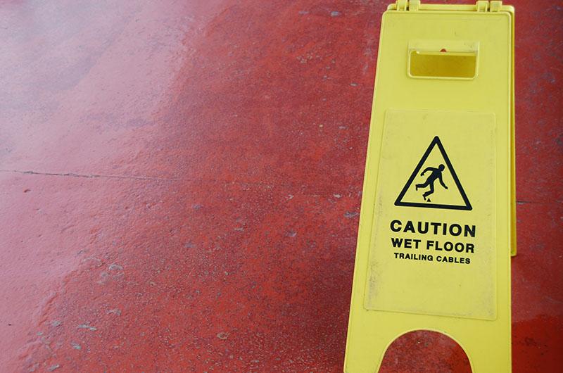 yellow caution wet floor sign