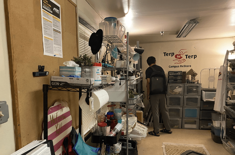 student shopping inside the Terp to Terp reuse storage room