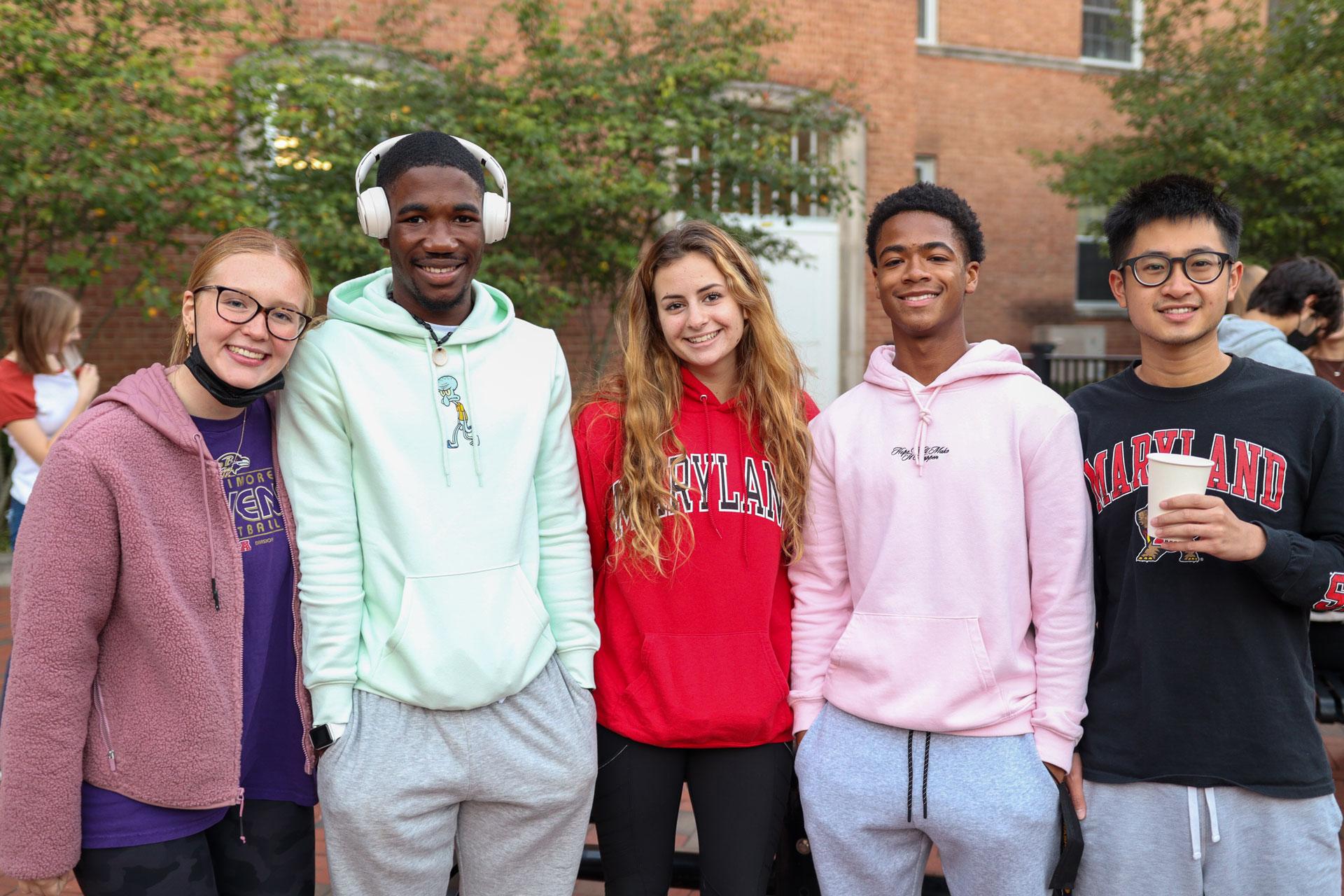 group of students outside of a residence hall
