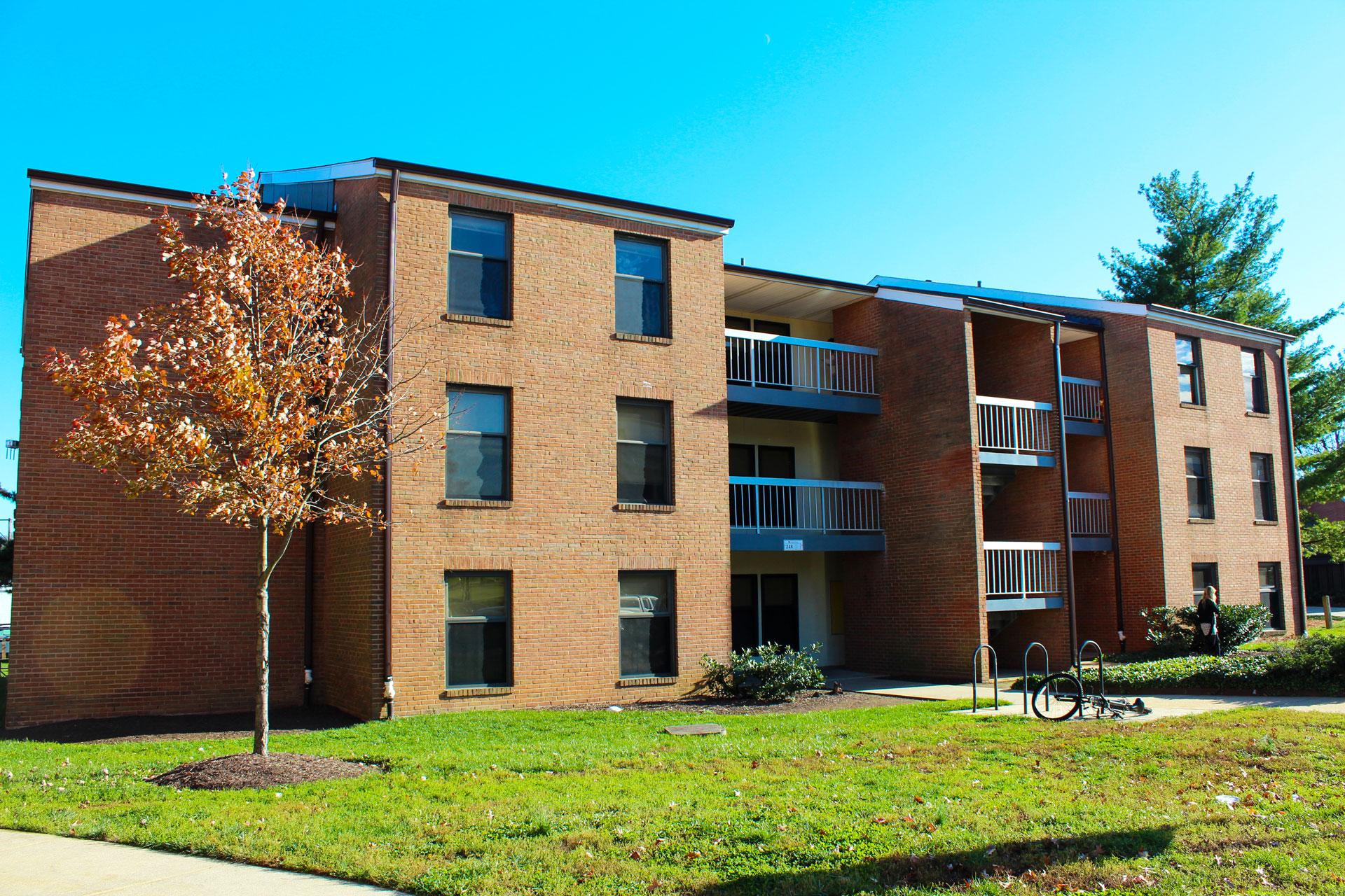 exterior view of Leonardtown apartment complex on a sunny day