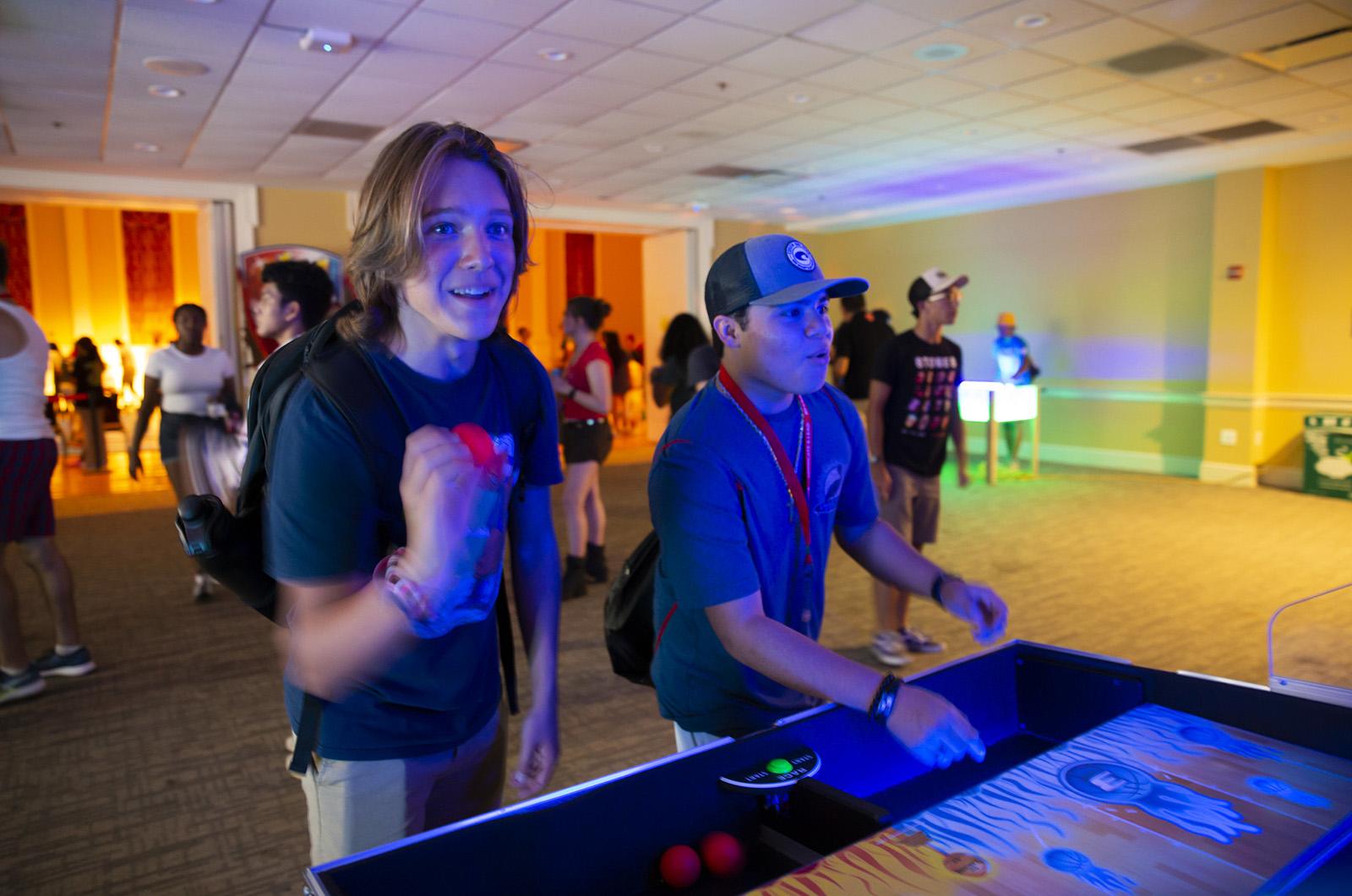 students playing games during Fall Welcome's Retro RHArcade