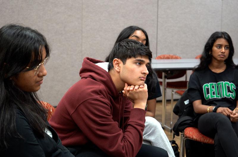 Students sitting in circle