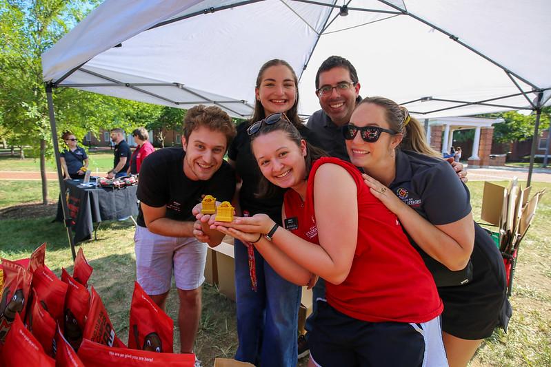 program assistants and staff tabling at the South Campus Block Party on Washington Quad